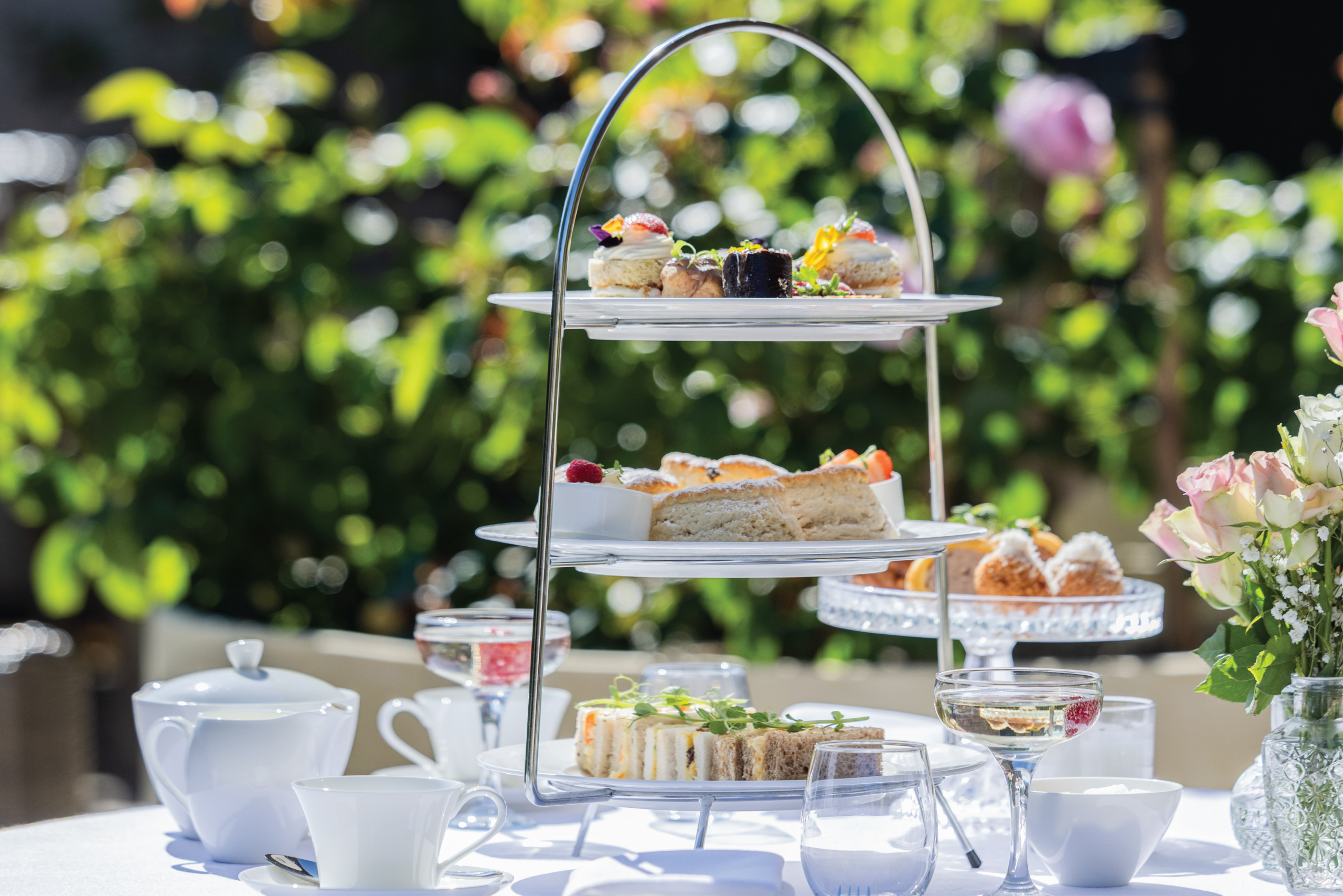 Three-tier afternoon tea with sandwiches, scones and cakes at Dalton Old Pump House